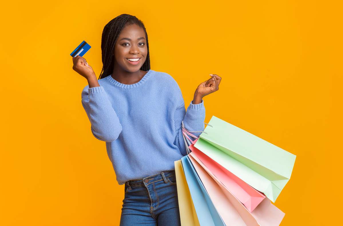 women holding credit card women holding credit card
